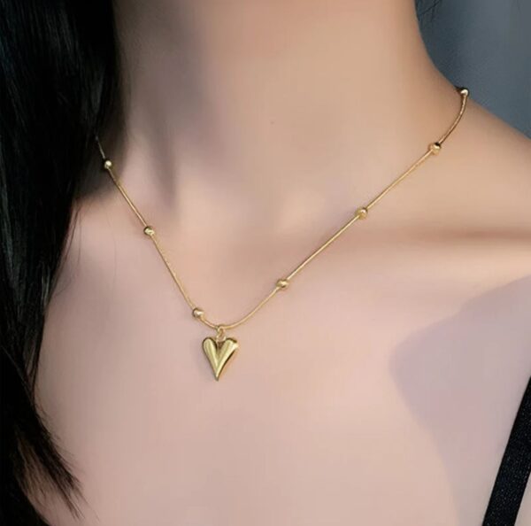 Gold plated stainless steel anti tarnish heart themed pendant