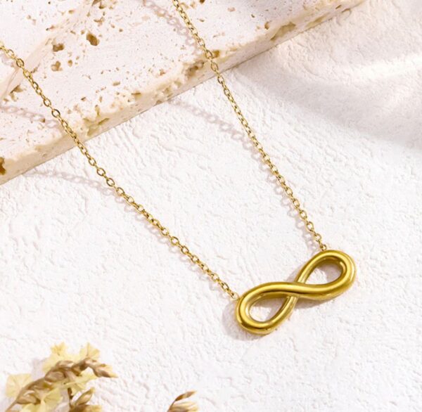 Gold plated anti tarnish stainless steel infinity themed contemporary pendant for women