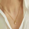 Gold plated stainless steel anti tarnish pearl studded contemporary pendand