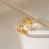 Gold plated stainless steel anti tarnish clover themed adjustable finger ring