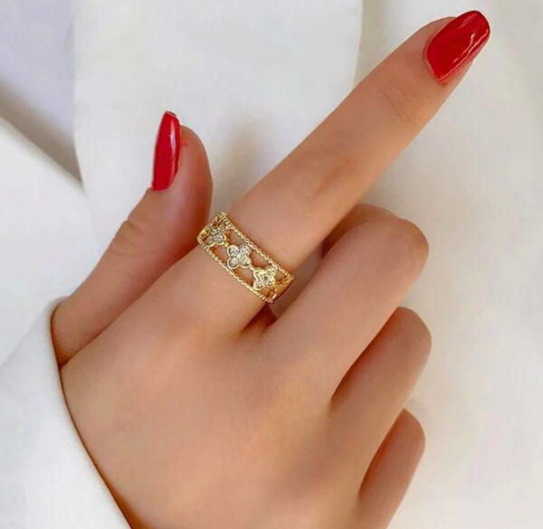 Gold plated stainless steel anti tarnish clover themed adjustable finger ring