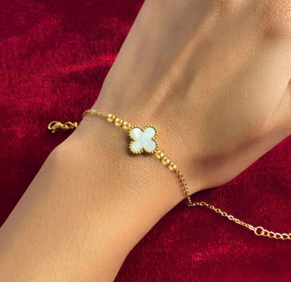 Gold plated stainless steel anti tarnish white clover themed wraparound bracelet